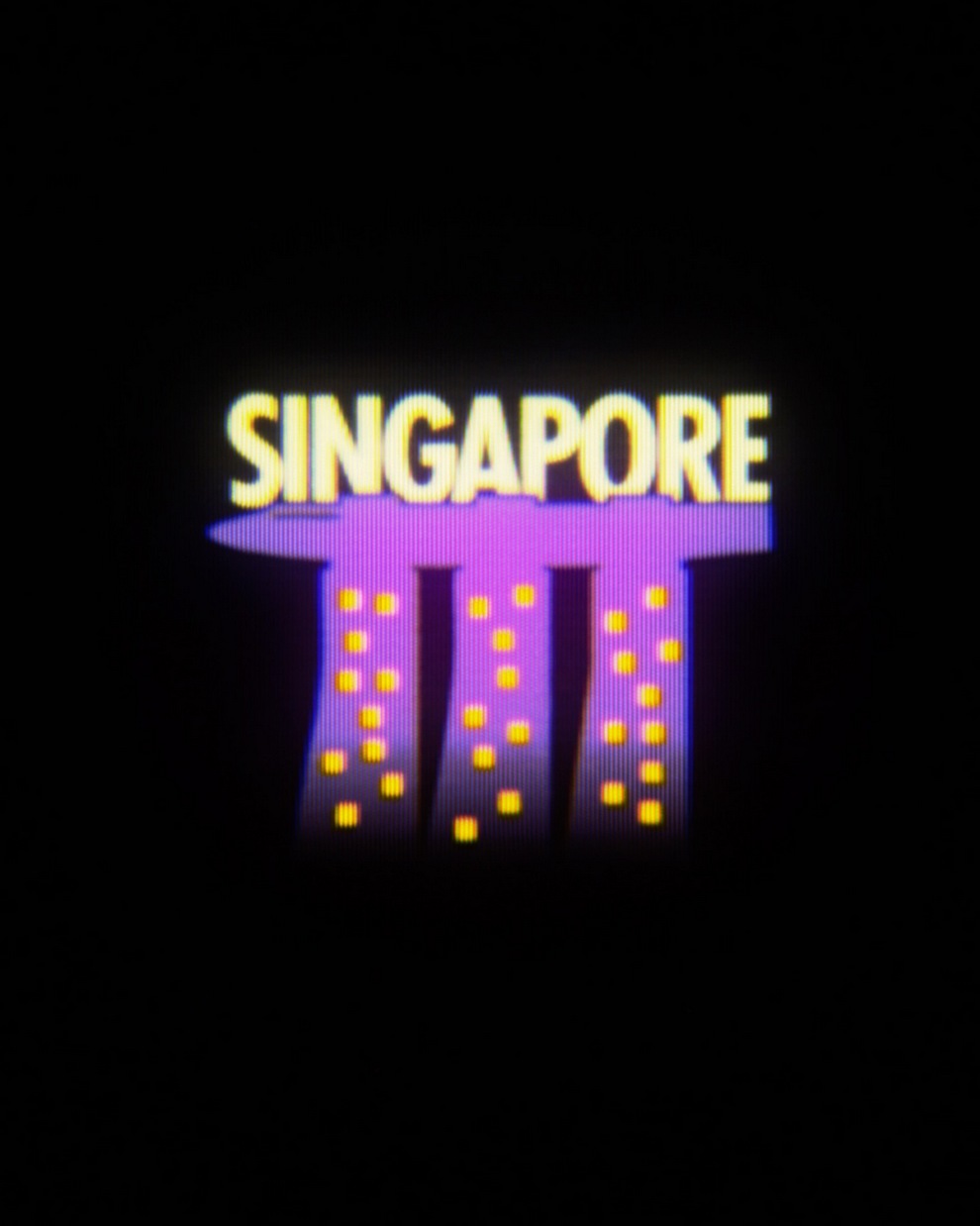 Stylized logo with the word 'SINGAPORE' in bright letters and a graphic representation of buildings illuminated with yellow lights, set against a dark background.