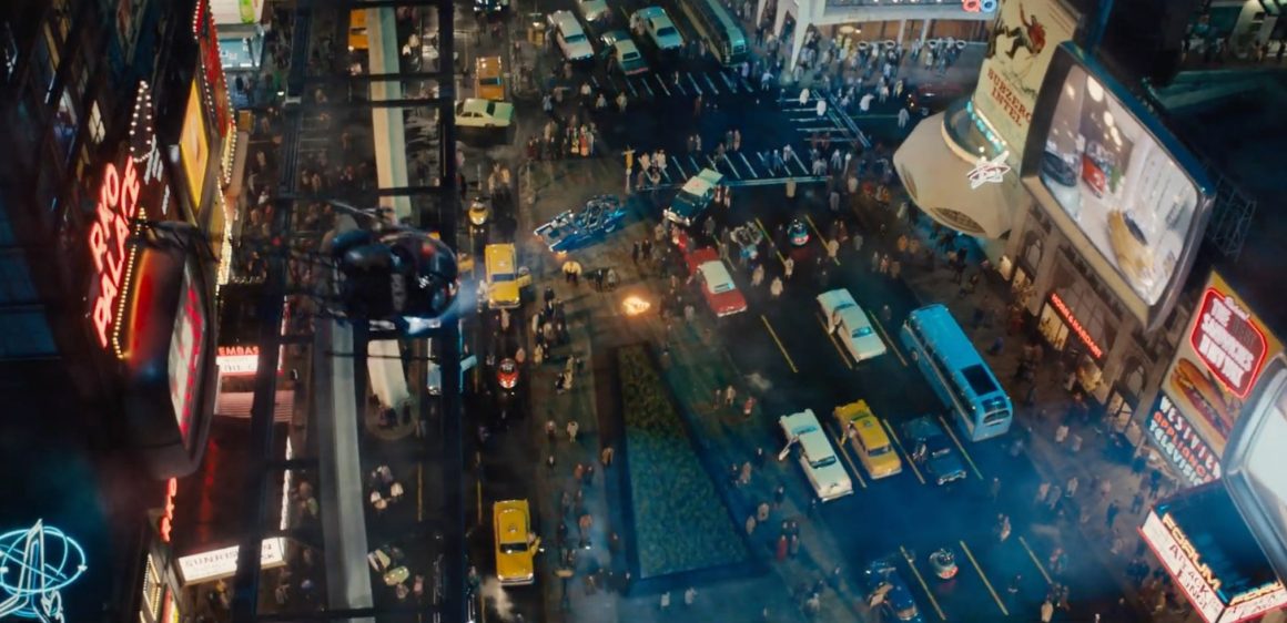 Aerial view of a busy city street, filled with people and vehicles, featuring bright neon signs and billboards.