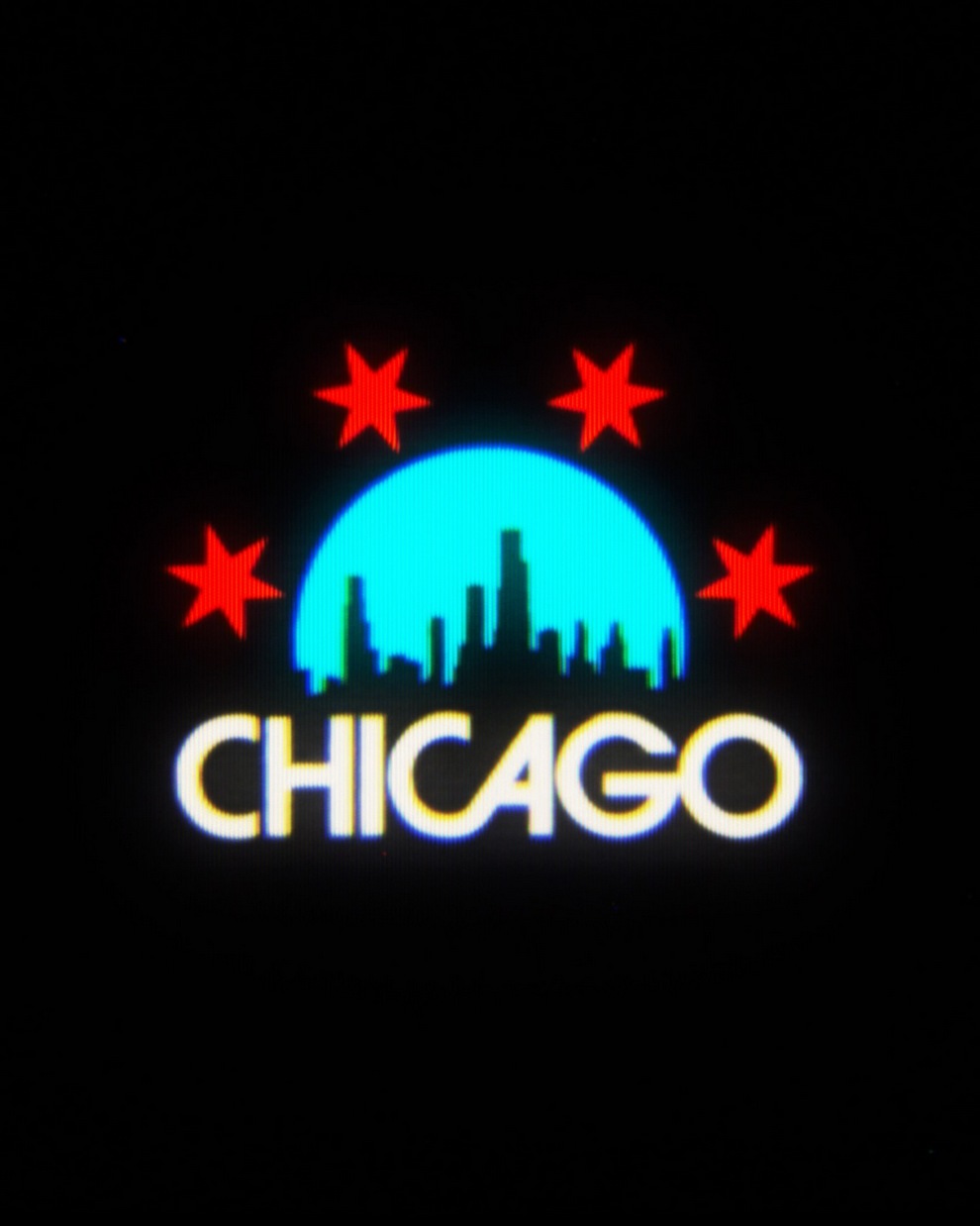 Logo representing Chicago featuring a skyline silhouette, a blue circular background, and four red stars above the cityscape.