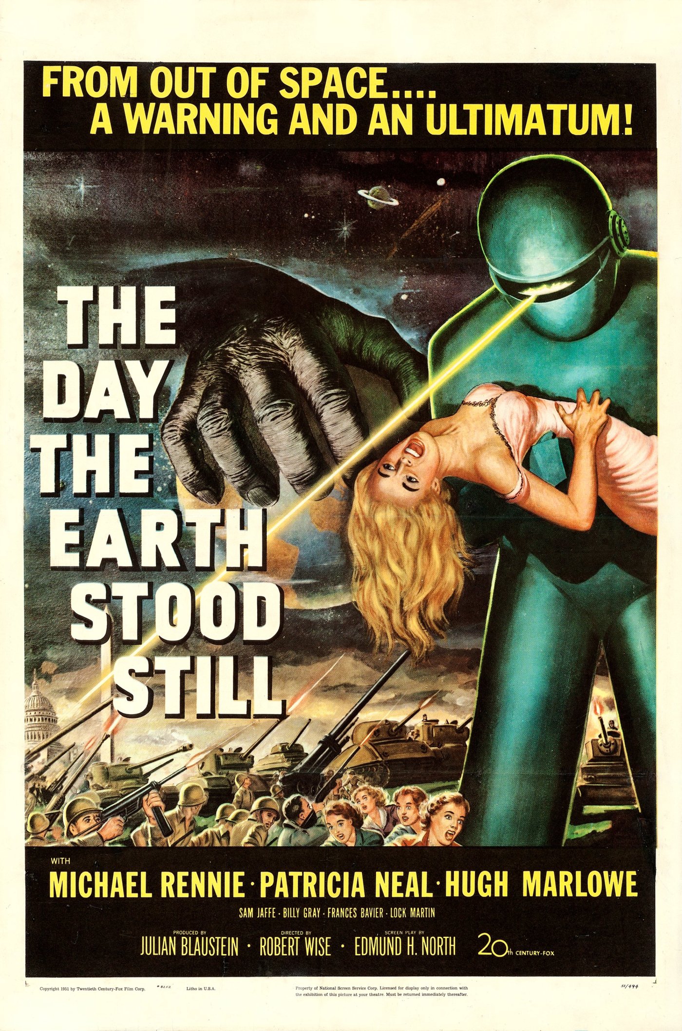 Poster for The Day the Earth Stood Still, 1951: a giant green robot fires a ray from its visor and carries a fainting blonde woman while a huge hand grips the Earth, under the words From out of space, a warning and an ultimatum