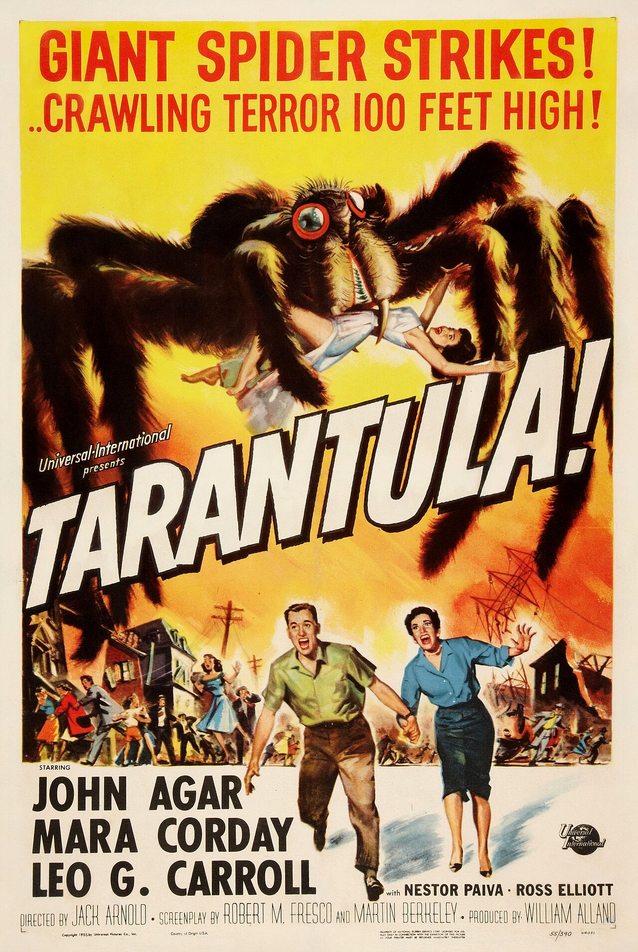 Reynold Brown one-sheet poster for Tarantula from 1955, a colossal brown hairy spider with glowing red eyes holding a limp woman in a white nightgown above a burning orange town, with a man and woman running toward the viewer and the title in huge slanted white letters on yellow